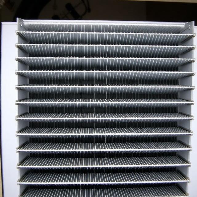 Clean AC evaporator coil after professional repair service