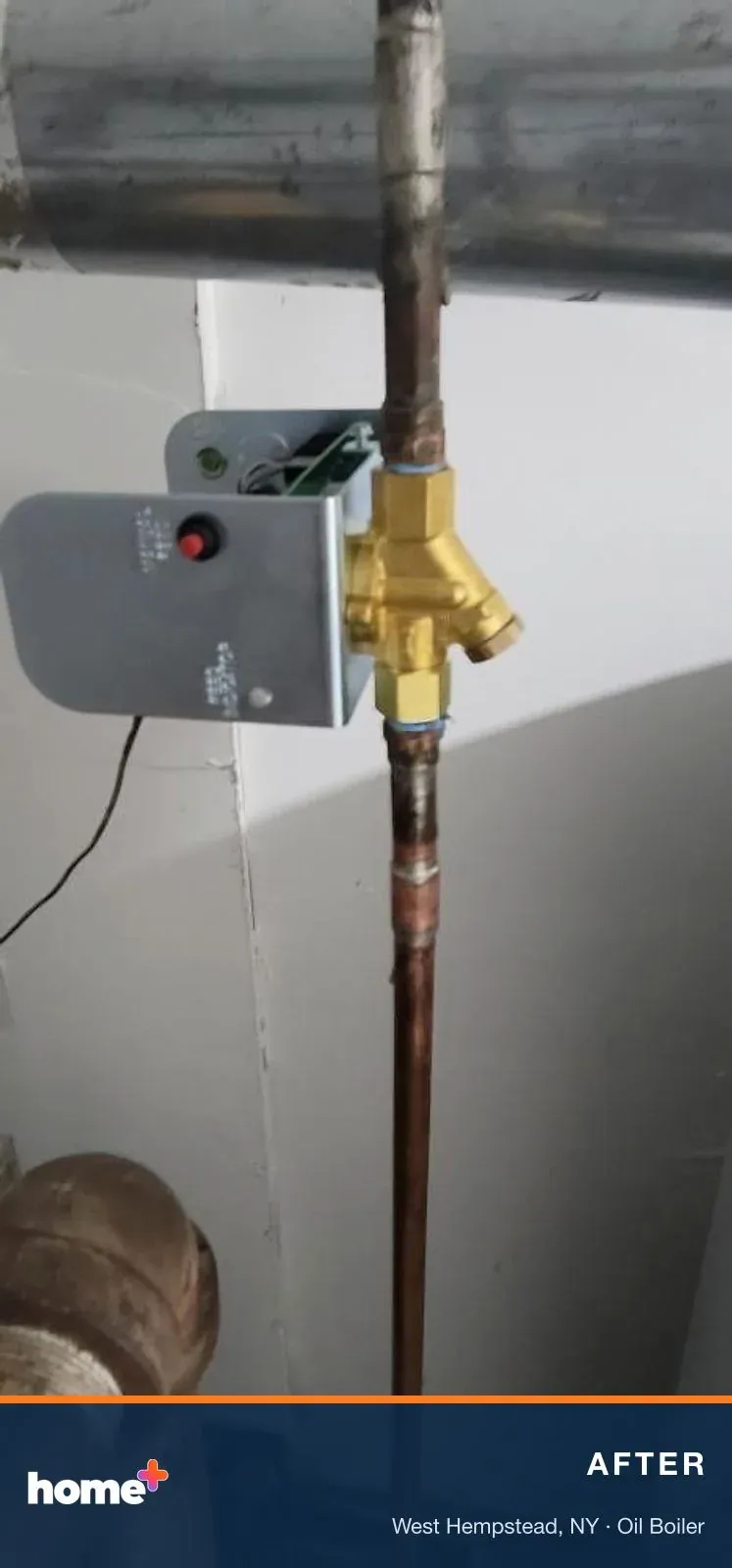 With the cover off: the new brass feeder valve body, with the manual-feed control mounted on it.